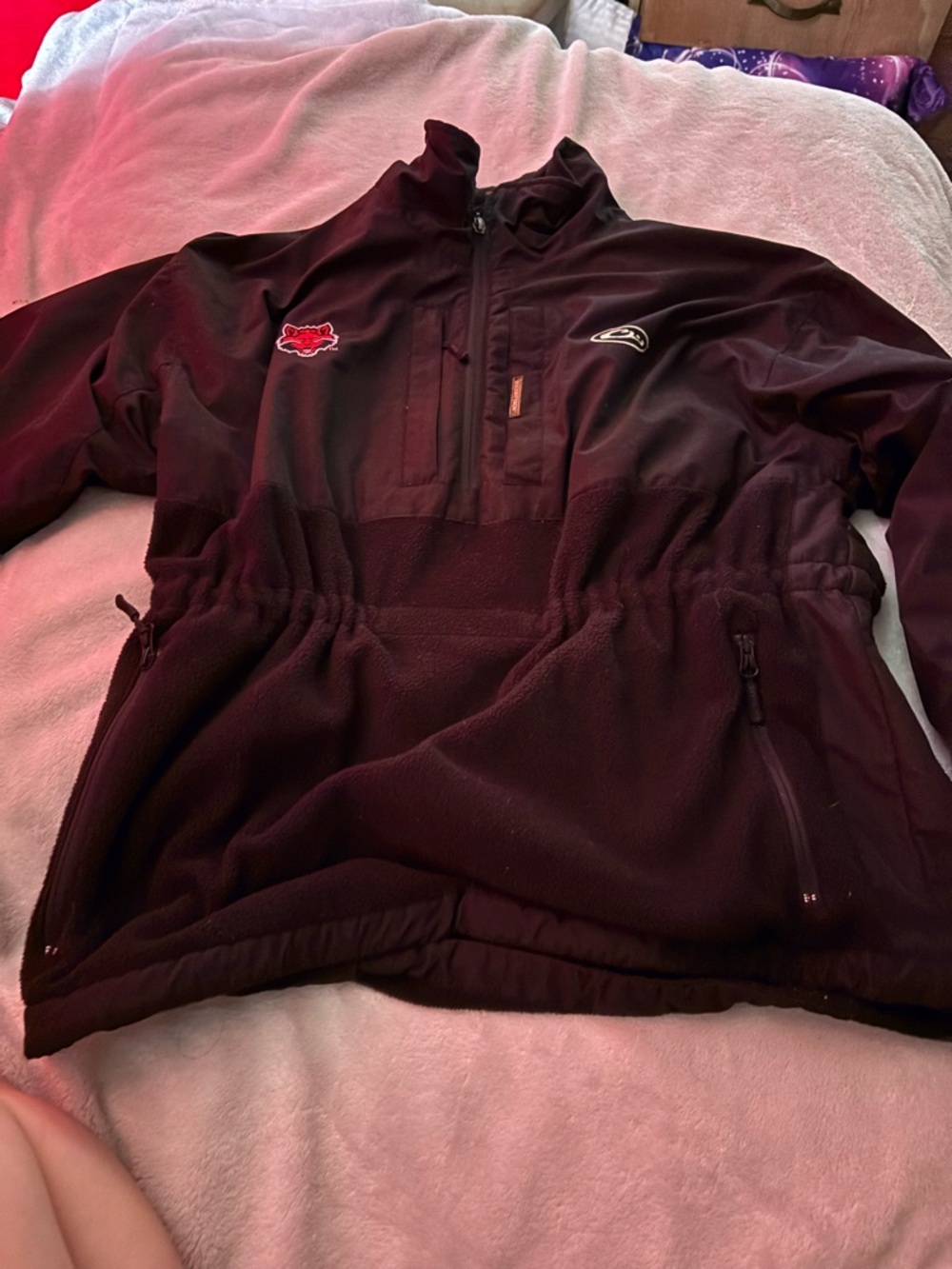 Drake jacket with red wolf symbol on it in size medium